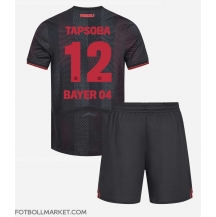 Bayer Leverkusen Edmond Tapsoba #12 Replika Hemmatröja Barn 2025-26 Kortärmad (+ byxor)